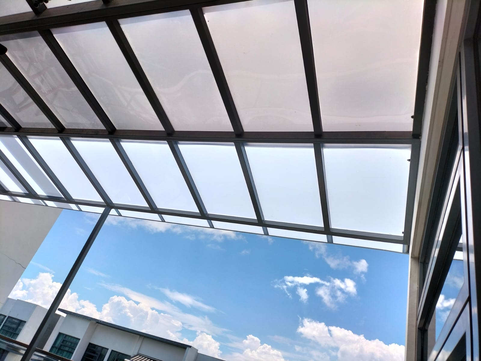 Roof shelter Singapore using translucent polycarbonate panels