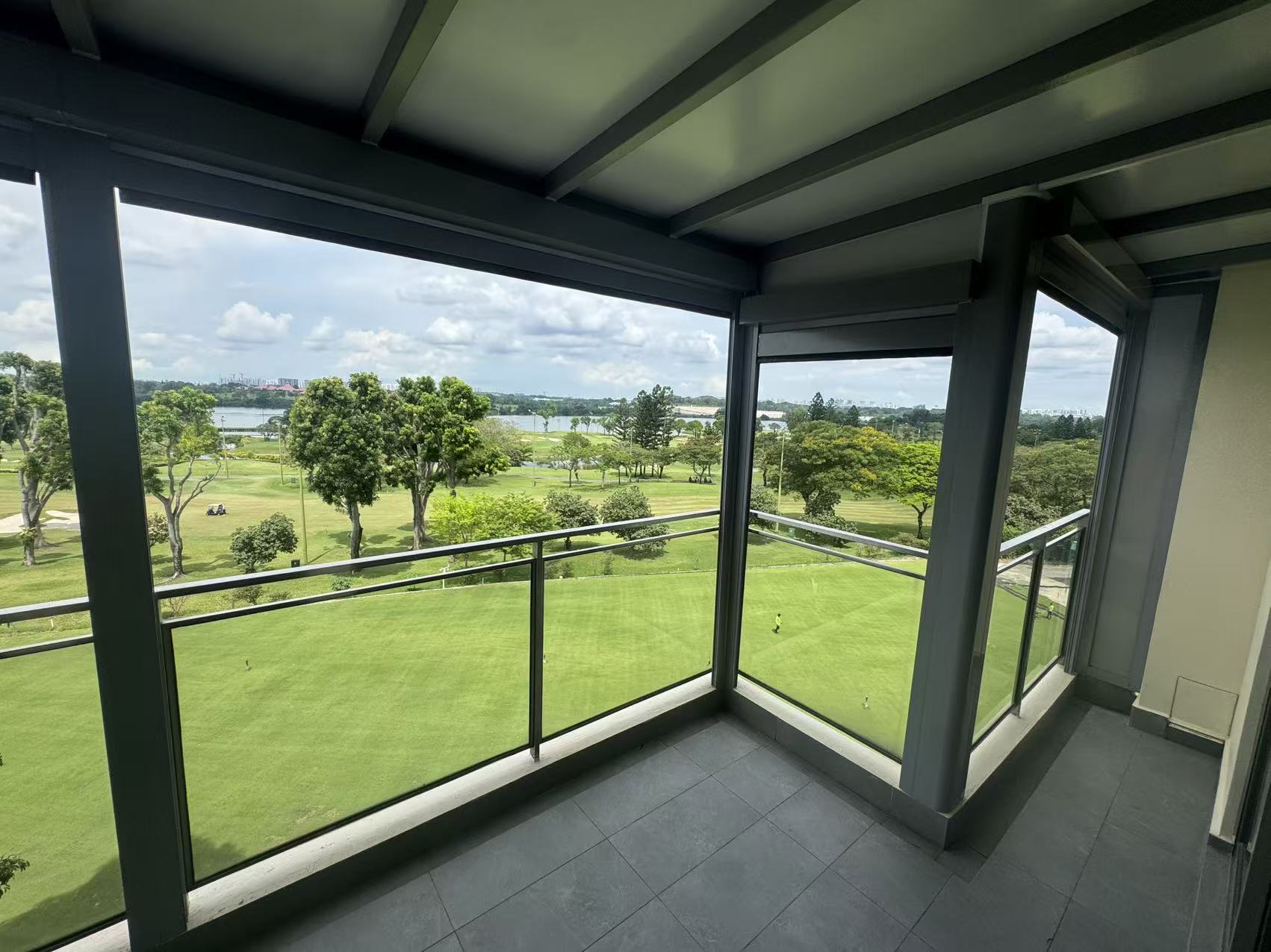 Covered balcony roof shelter with controlled drainage and open views
