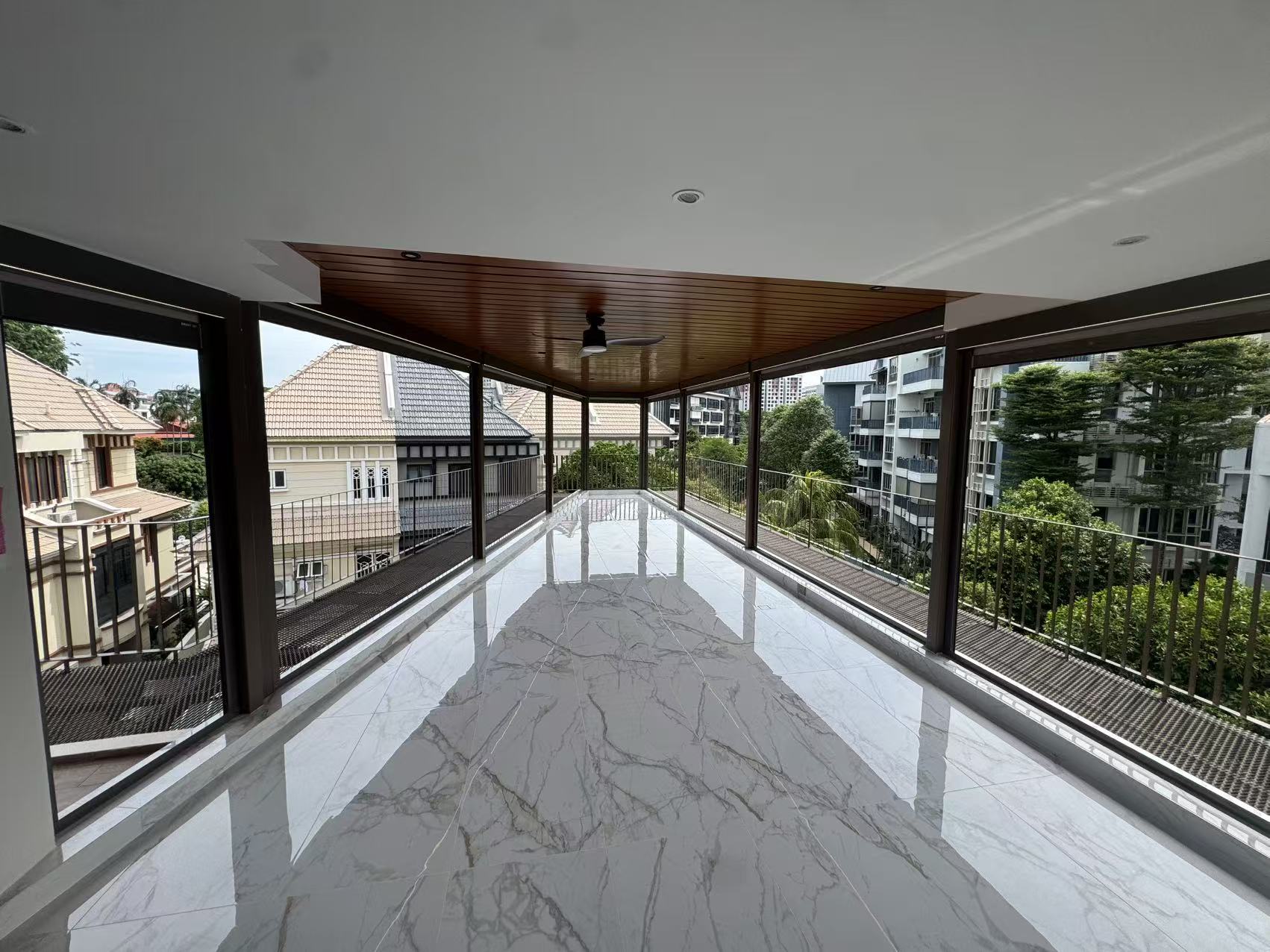 Rainproof pergola Singapore covering a residential balcony