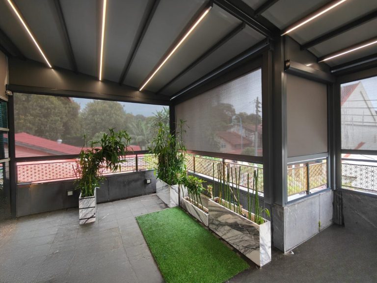 Pergola defining an outdoor terrace seating area — pergola singapore