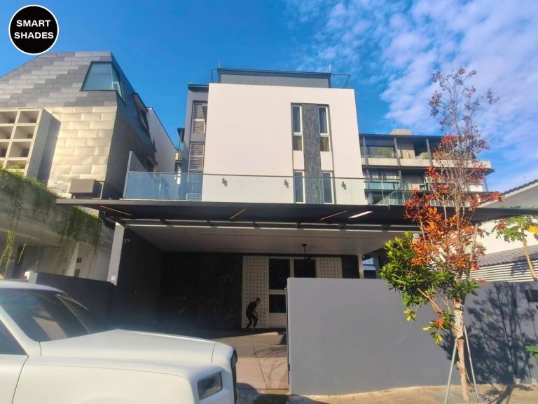 Front view of a house with an awning above the entrance — retractable awning singapore